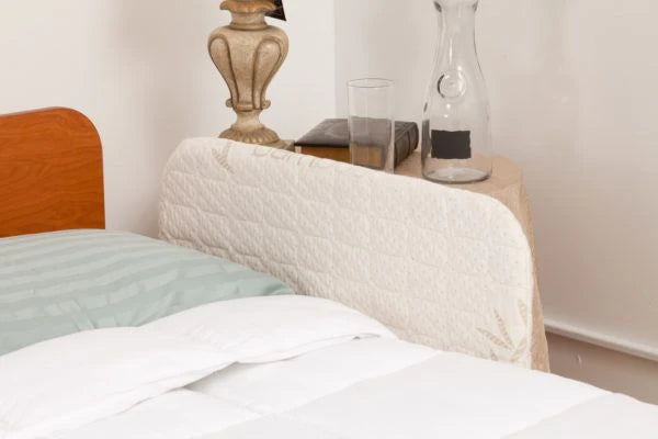 Transfer Master Assist Rail Covers quilted white fabric cover on bed rail for patient safety