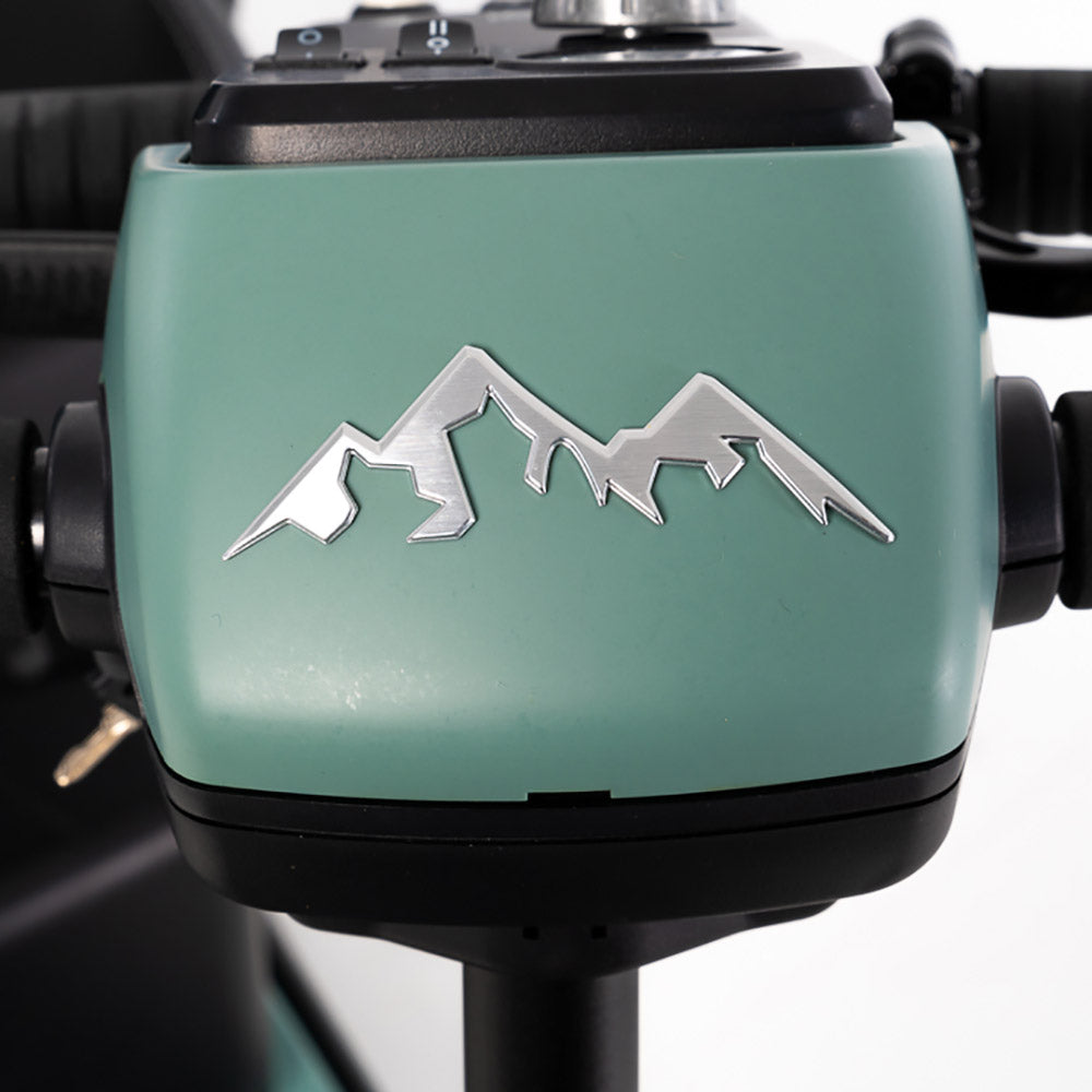 Close-up of the green control panel with mountain logo on Pride Mobility Baja Bandit mobility scooter