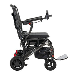 Side view of Pride Jazzy Carbon electric wheelchair in black with joystick control and padded seat