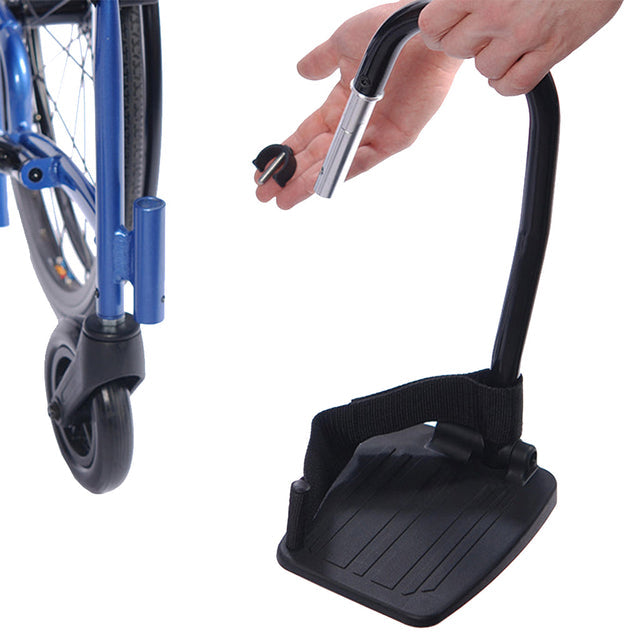STRONGBACK 24AB Transport Wheelchair 1007AB footrest attachment being installed on blue wheelchair frame