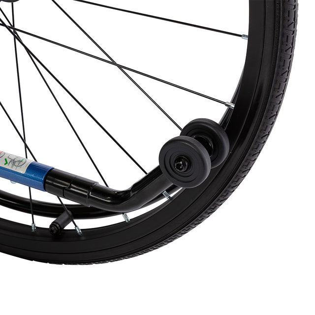 Close-up of STRONGBACK 24AB Transport Wheelchair 1007AB black tire with support wheels and metal spokes