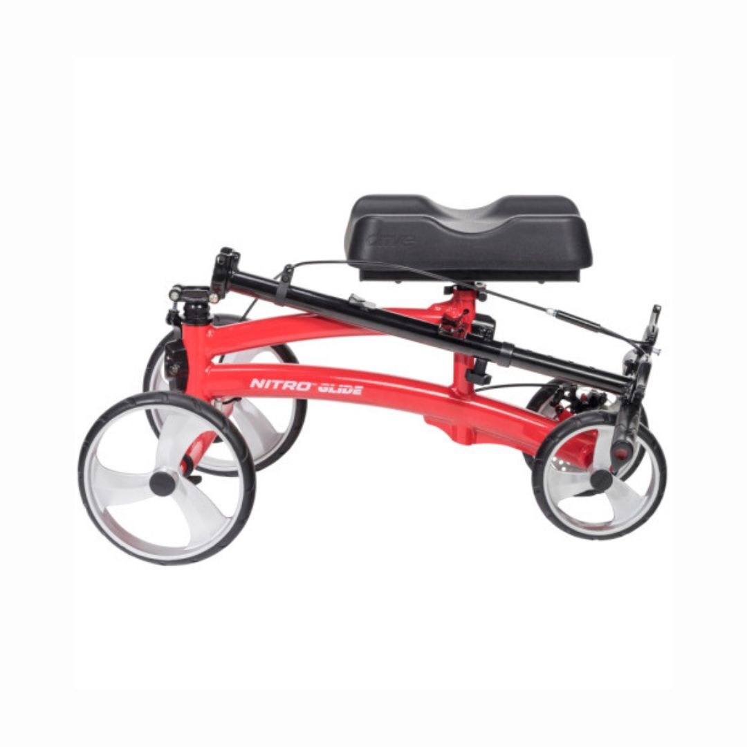 Drive Medical Nitro Glide Knee Walker in red with black cushioned knee platform and four wheels
