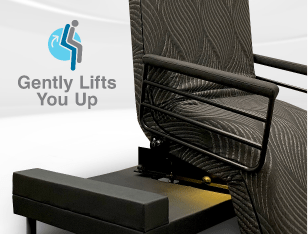 Close-up of THE INDEPENDENCE BED reclining chair with black armrest and gentle lift feature