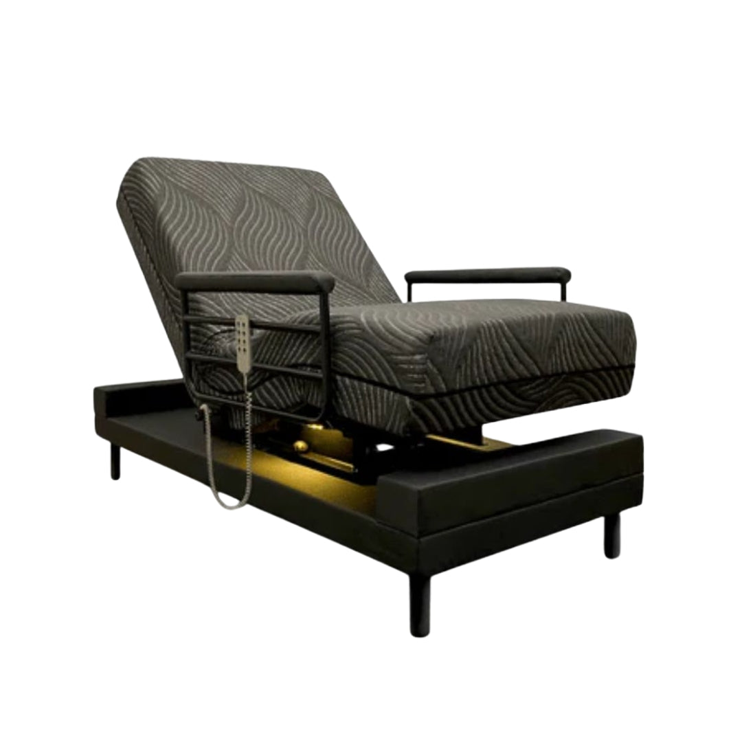 Adjustable reclining chair style bed with remote control and black textured upholstery THE INDEPENDENCE BED