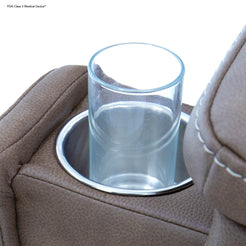 Clear glass cup in the built-in cup holder of Pride Mobility VivaLift Ultra PLR4955L beige recliner chair