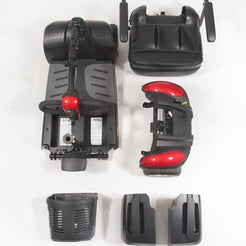 Buzzaround EX Extreme 4 Wheel Mobility Scooter disassembled showing seat, basket, and base components