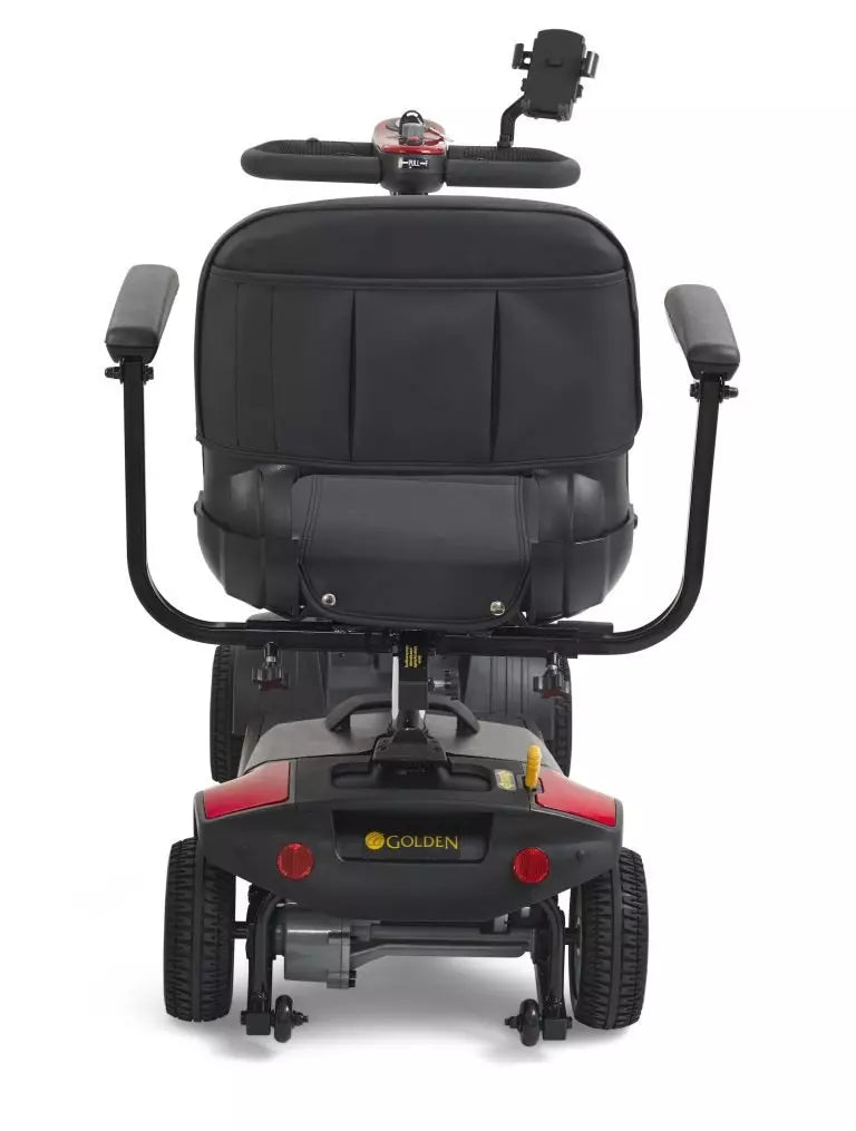 Rear view of GOLDEN TECHNOLOGIES Buzzaround XL 4 Wheel Mobility Scooter with comfortable seating and adjustable armrests