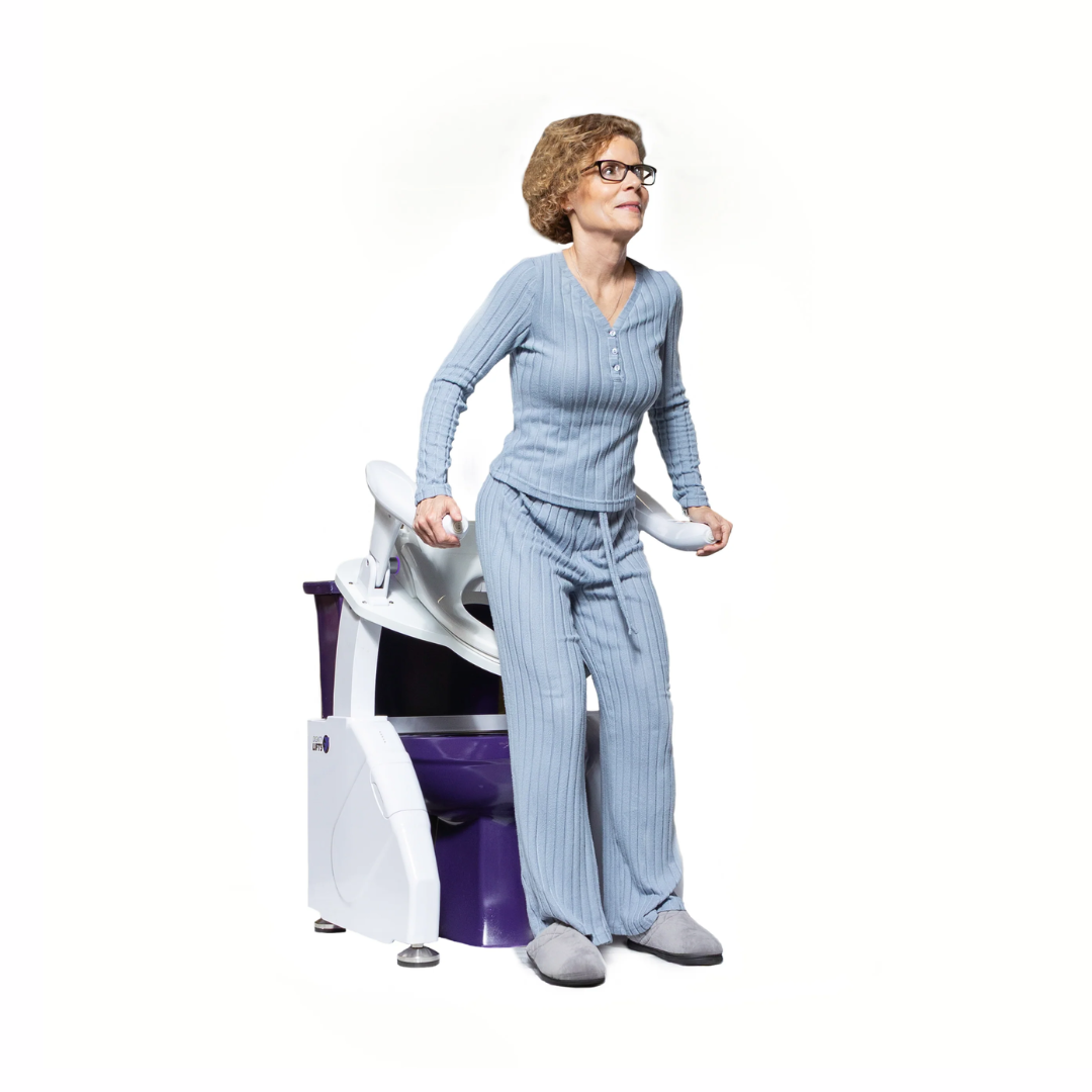 User demonstrating DIGNITY LIFTS BIDET TOILET LIFT for comfortable and safe bathroom access