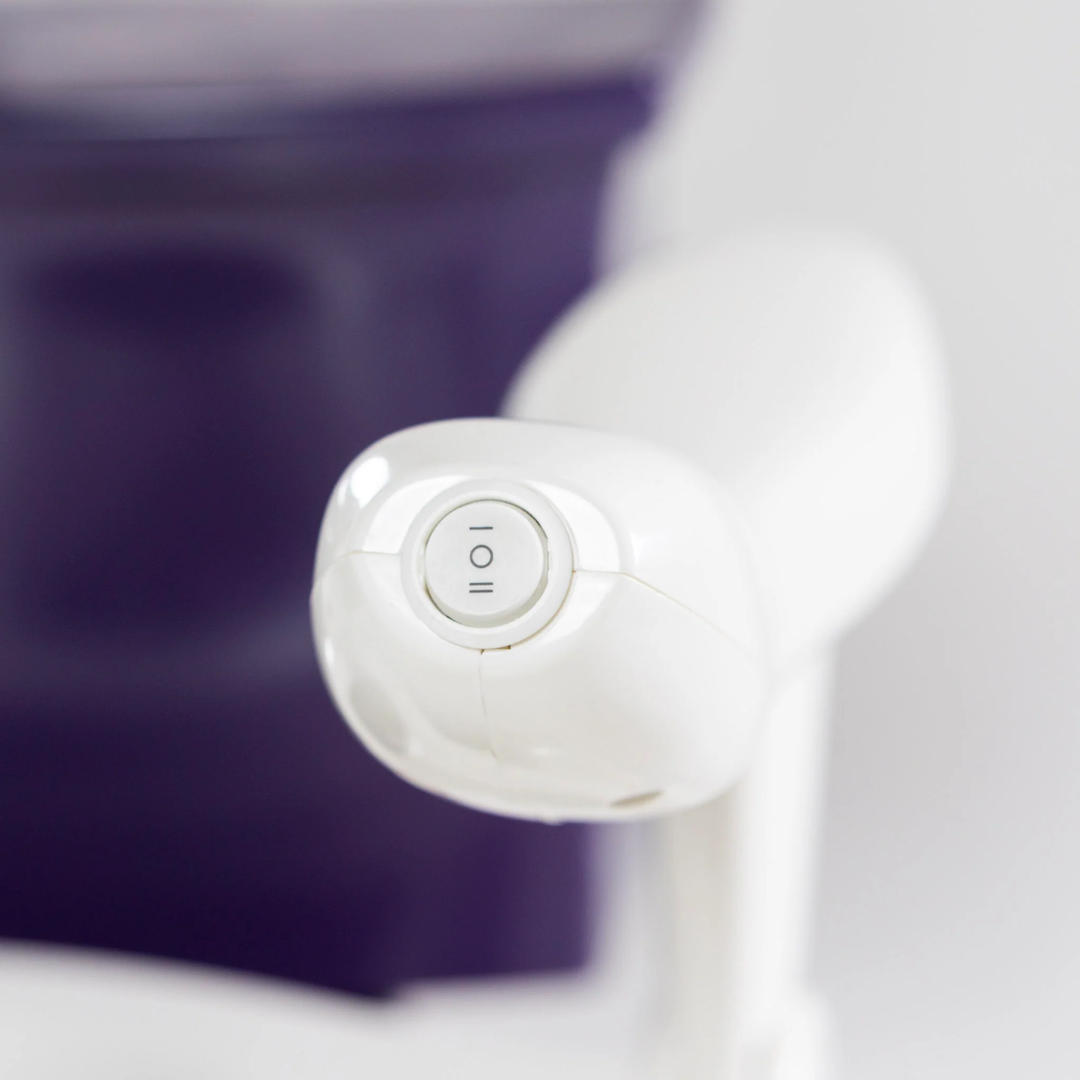 Control panel of Dignity Lifts Deluxe Toilet Lift with easy-to use buttons for convenience