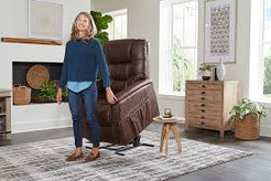 Golden Technologies Dione Power Lift Chair Recliner PR446 in brown, with user demonstrating lift function