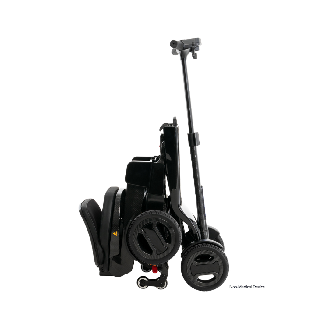 Folded Go Go Carbon Travel Mobility Scooter in black, compact design for easy transport and storage