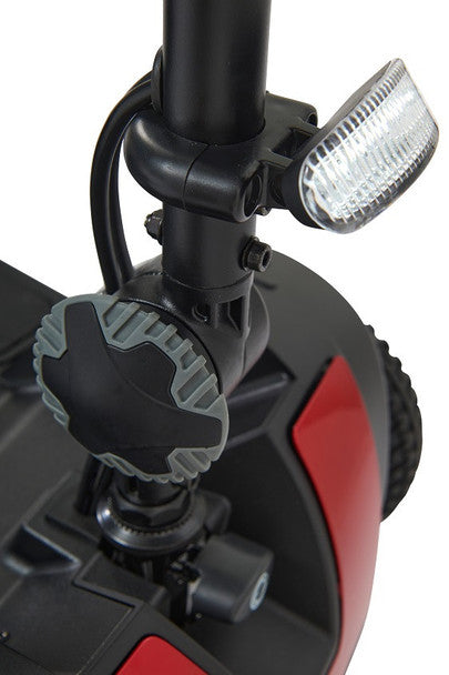 Close-up view of the Buzzaround XL 3 Wheel Mobility Scooter's adjustable headlight for enhanced visibility