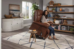 GOLDEN TECHNOLOGIES Cloud with Twilight Power Lift Chair Recliner in brown, person sitting comfortably