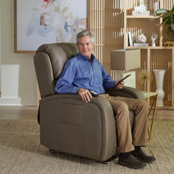 Golden Technologies EZ Sleeper with Twilight Lift Recliner PR761-MLA in gray, showcasing a man using remote