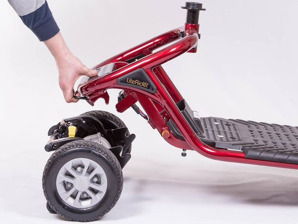 Golden Technologies LiteRider 4 Wheel Mobility Scooter in Red, shown in folding action
