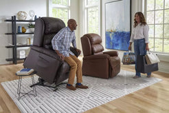 GOLDEN TECHNOLOGIES Relaxer power lift chair recliner PR766 in brown with a person sitting
