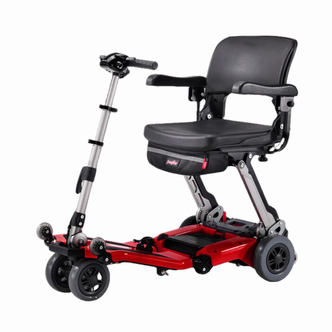 Luggie Super Foldable Mobility Scooter in red with a comfortable seat and adjustable handle for easy transport
