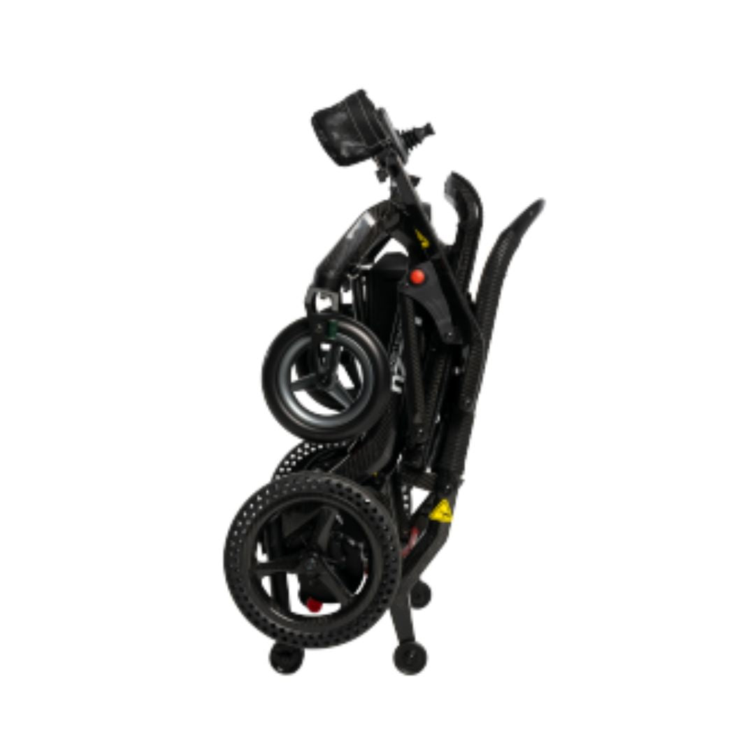 Pride Mobility Jazzy Ultra Light Carbon Fiber Foldable Power Chair in black, compactly folded for easy storage