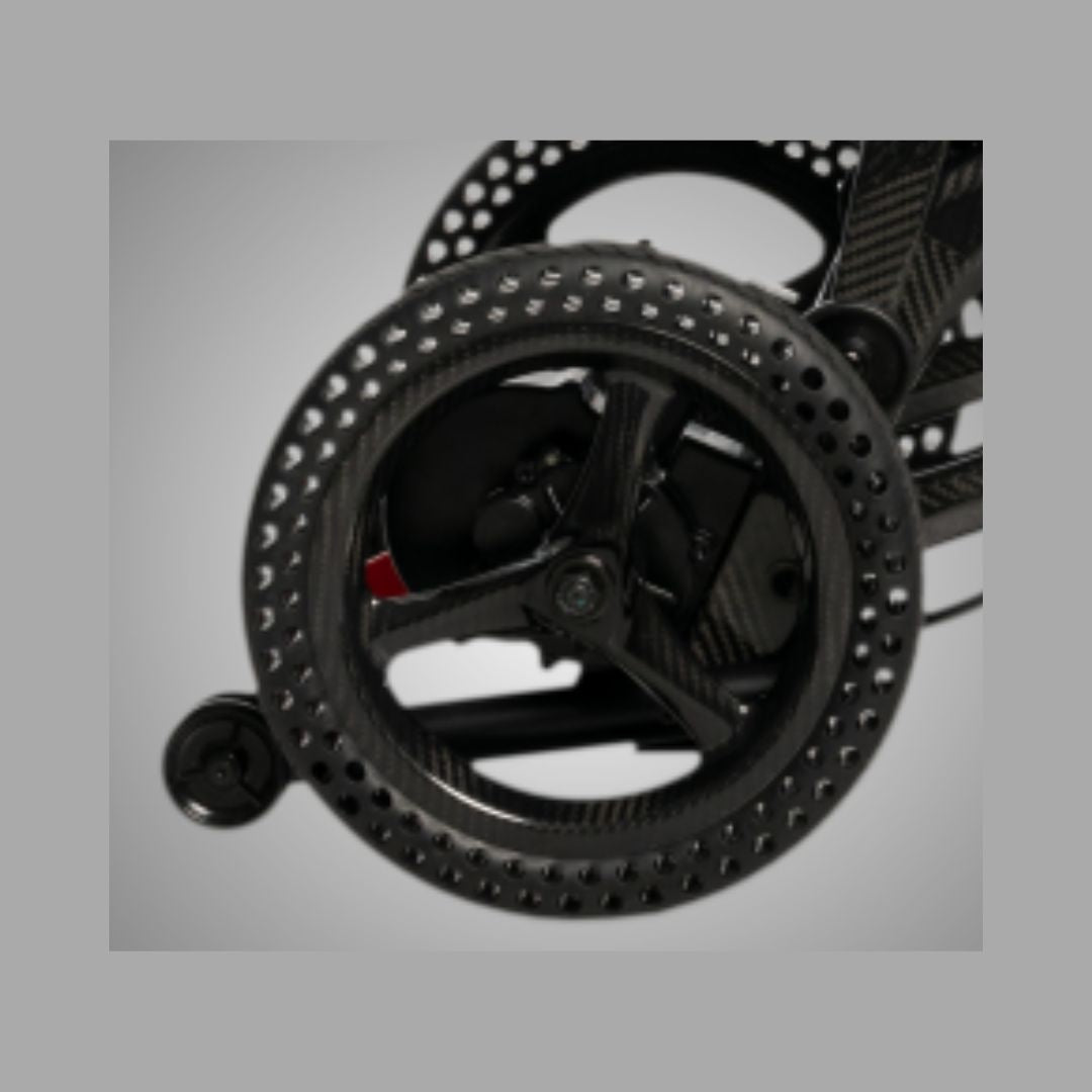 Pride Mobility Jazzy Ultra Light Carbon Fiber Foldable Power Chair close-up of wheel