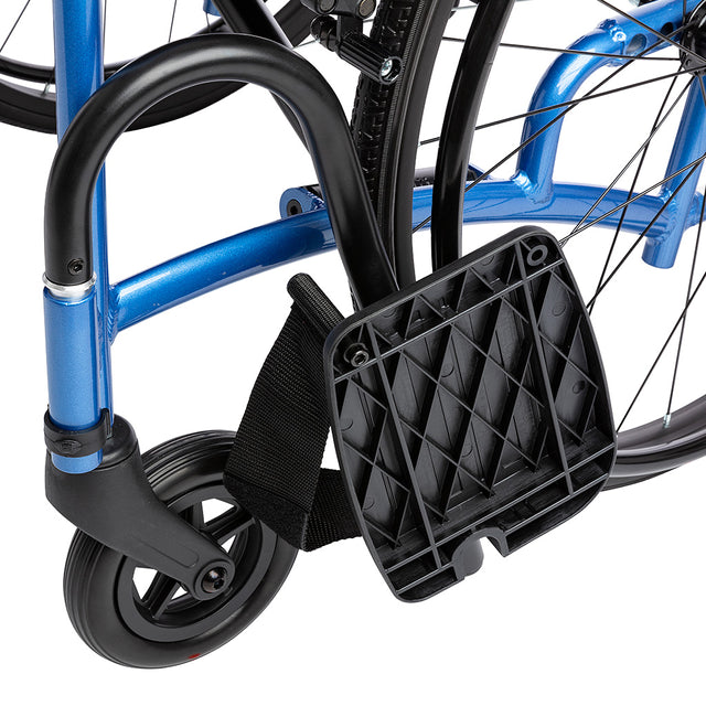 Close-up of the front wheel and footrest of Strongback Mobility 8 Transport Wheelchair 1002 in blue frame
