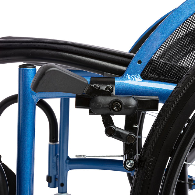 STRONGBACK 24 Flip Wheelchair 1019 close up of blue frame with manual brake lever rear wheel and mesh seat back