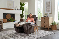 Golden Technologies Titan with Twilight Power Lift Chair Recliner in brown, featuring a user relaxing with feet elevated