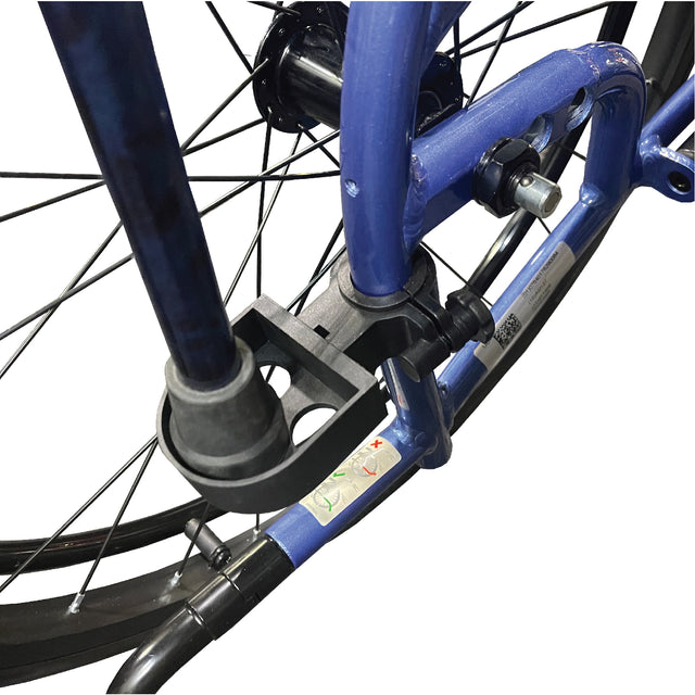 StrongBack Mobility Cane Holder For Wheelchair attached to blue wheelchair frame secures cane