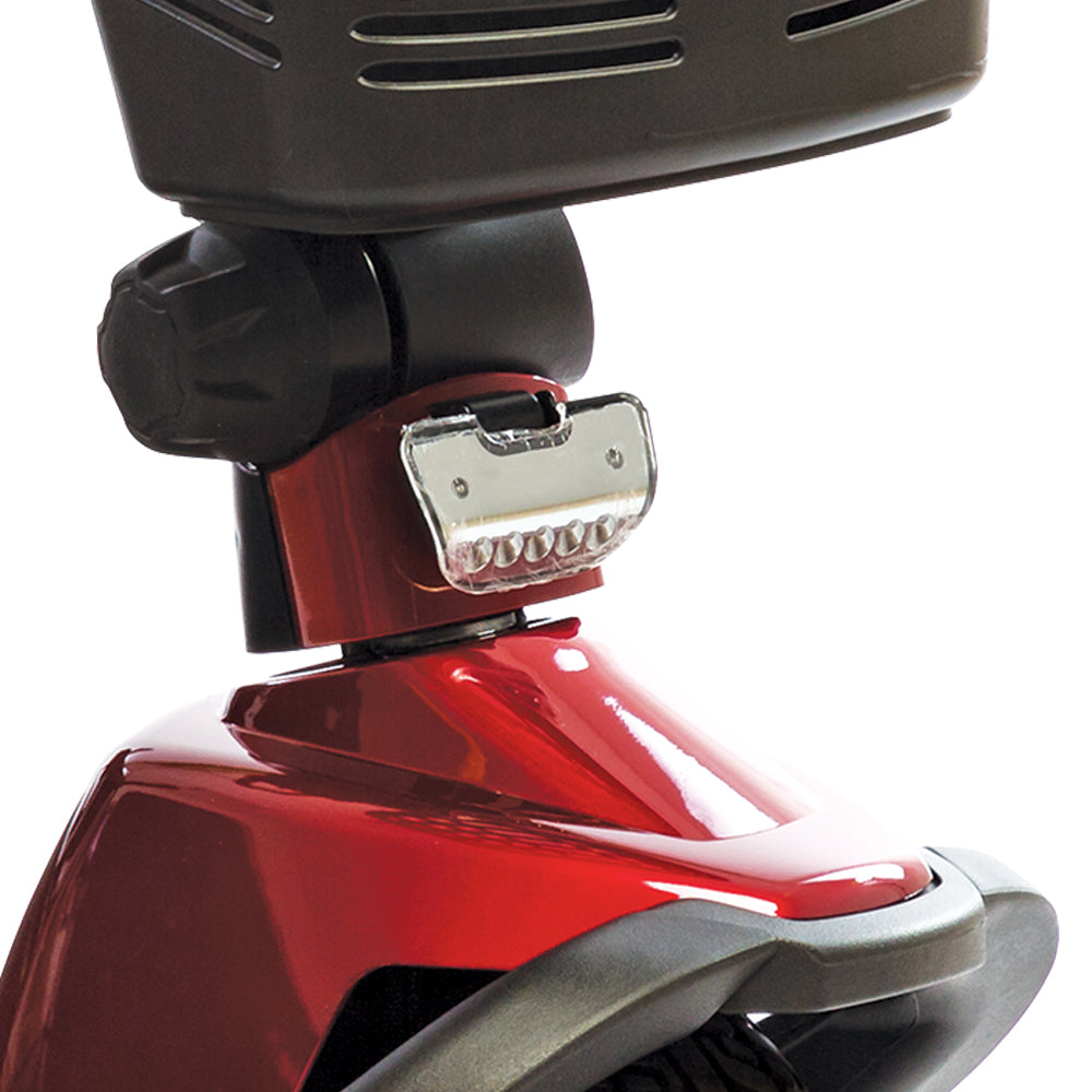 Close-up view of the Victory 10 3 wheel Mobility Scooter's control panel and steering mechanism in red