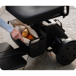 WHILL Model R Urban 4 Wheel Mobility Scooter with storage basket for groceries