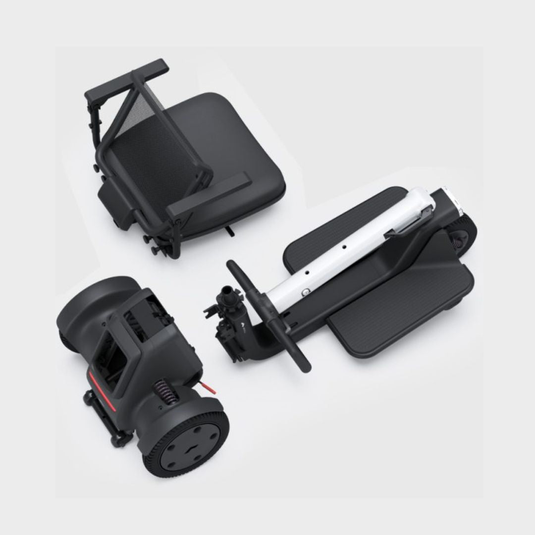WHILL Model R Urban Mobility Scooter folded for compact storage and easy transport