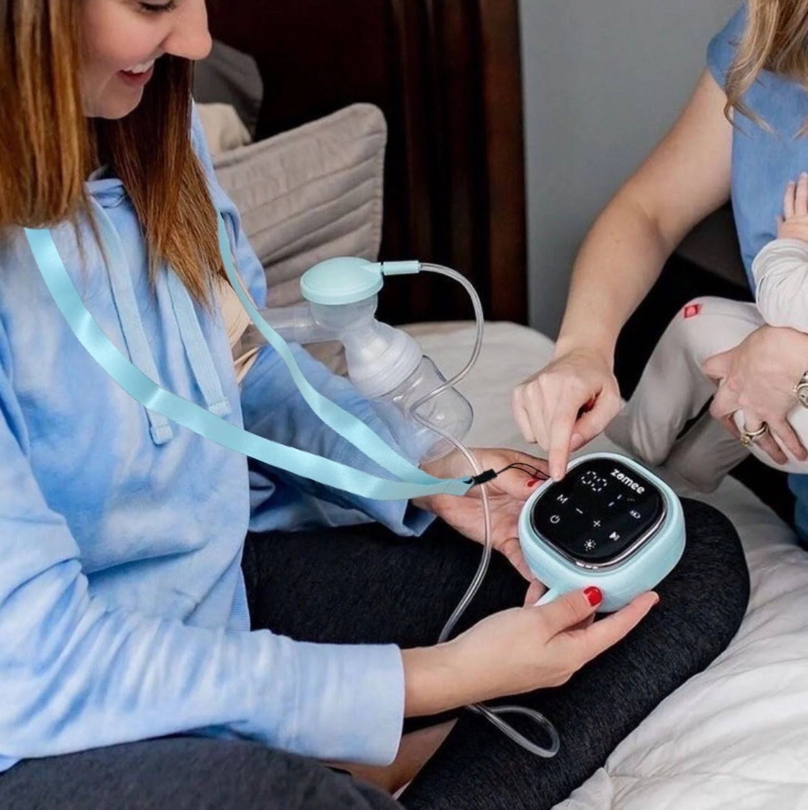 Z2 Double Electric Breast Pump in use with adjustable settings during breastfeeding session